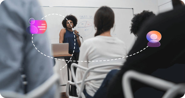 A trainer presenting to a small team in an SME